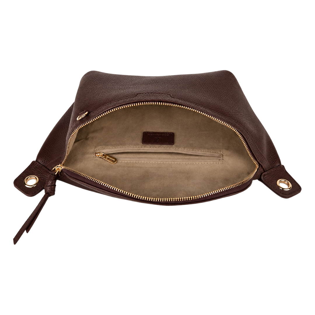 Open interior of the BOSTANTEN crescent belt bag showing the zip pocket in burgundy pebbled leather, on a white background